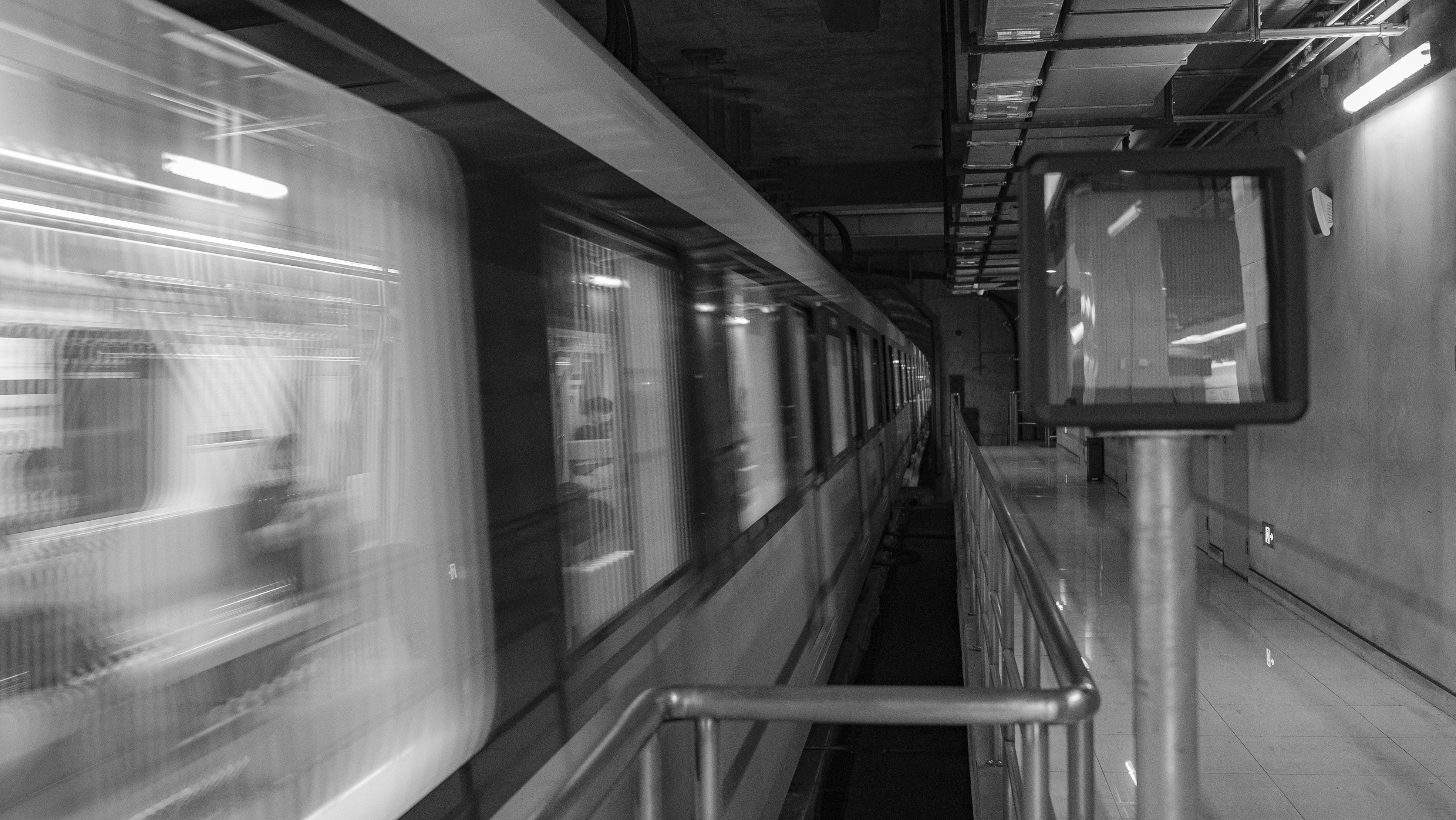 grayscale photo of train station
