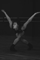 woman in black tank top and black shorts