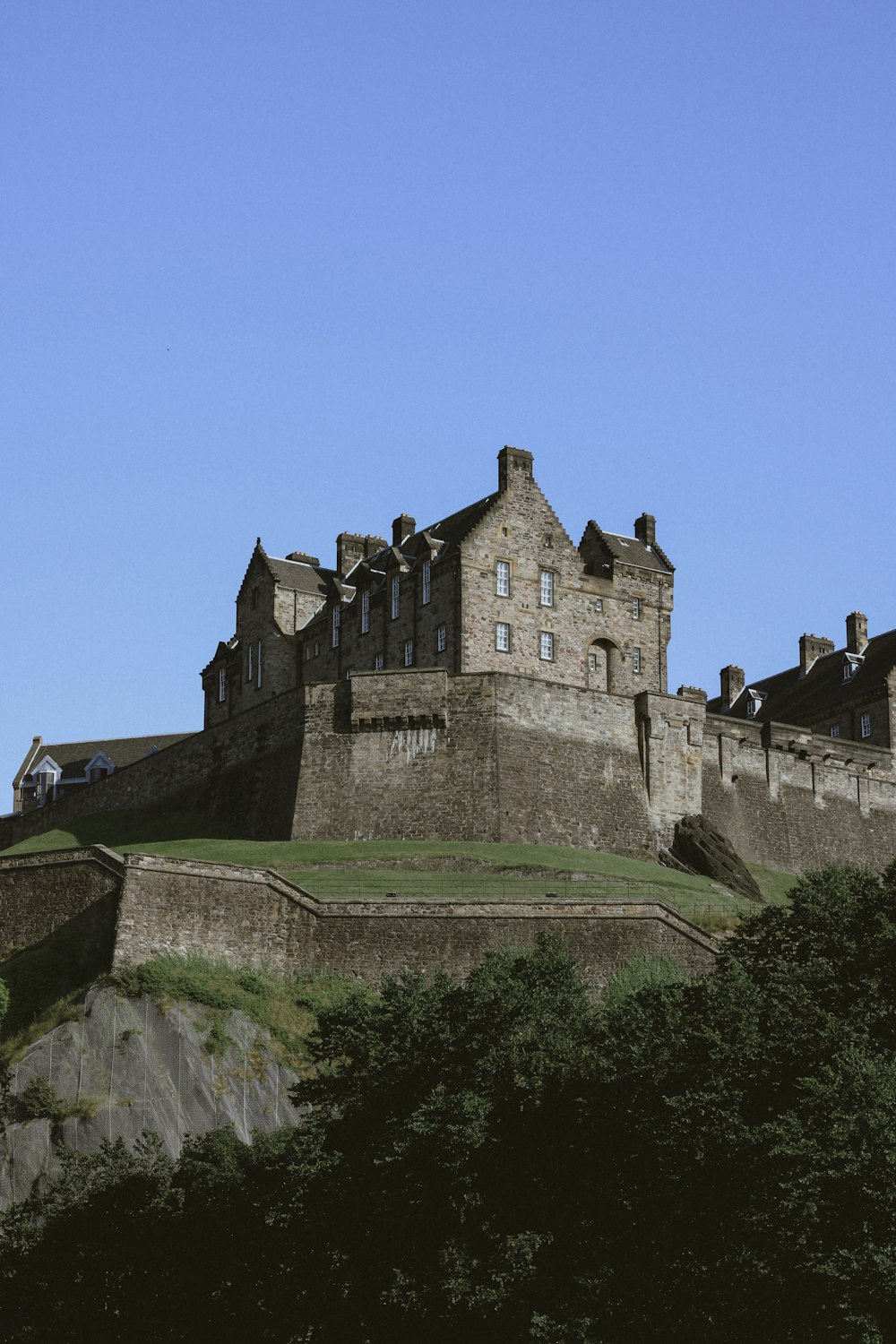 gray concrete castle under blue sky during daytime