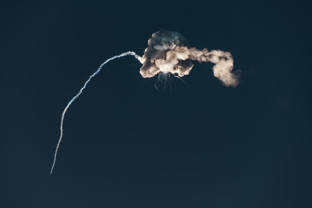 white smoke on black background