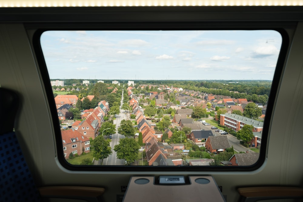 cars on road near buildings during daytime