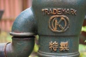 Close-up of eco pipe HDPE pipe markings showing pressure ratings and certification stamps.