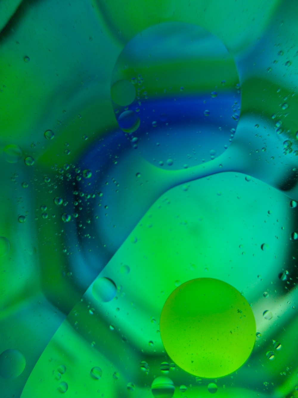 blue water drop in green container