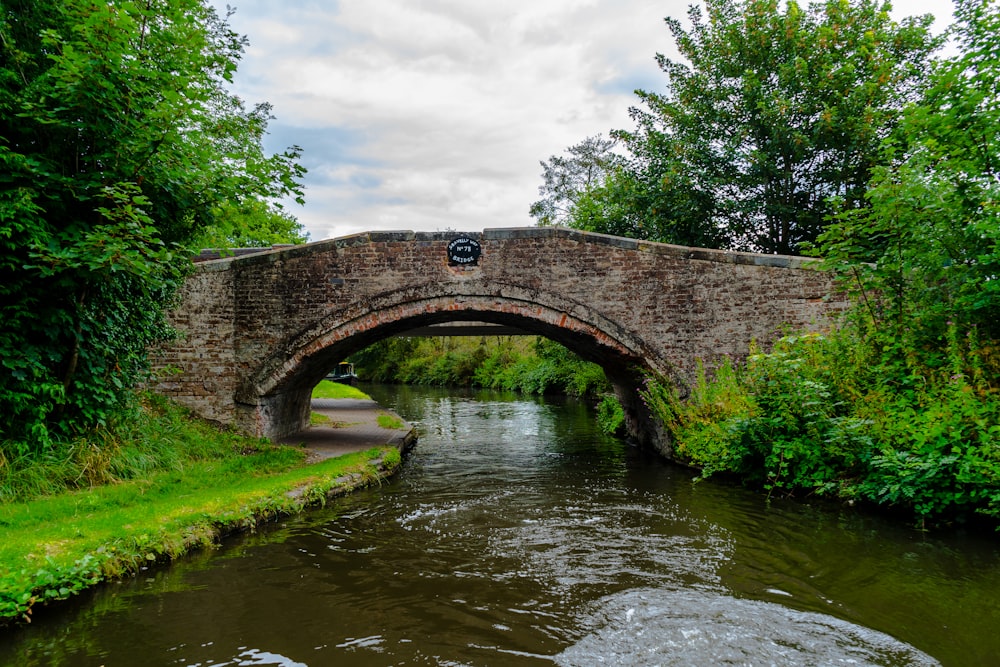 brown concrete bridge over river