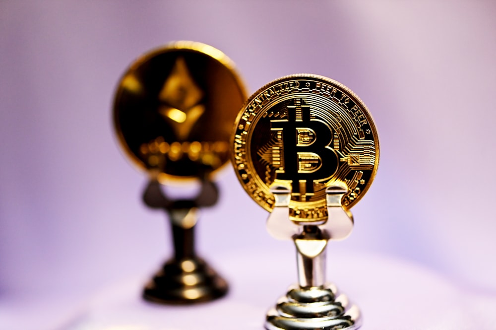 gold and black trophy on white table