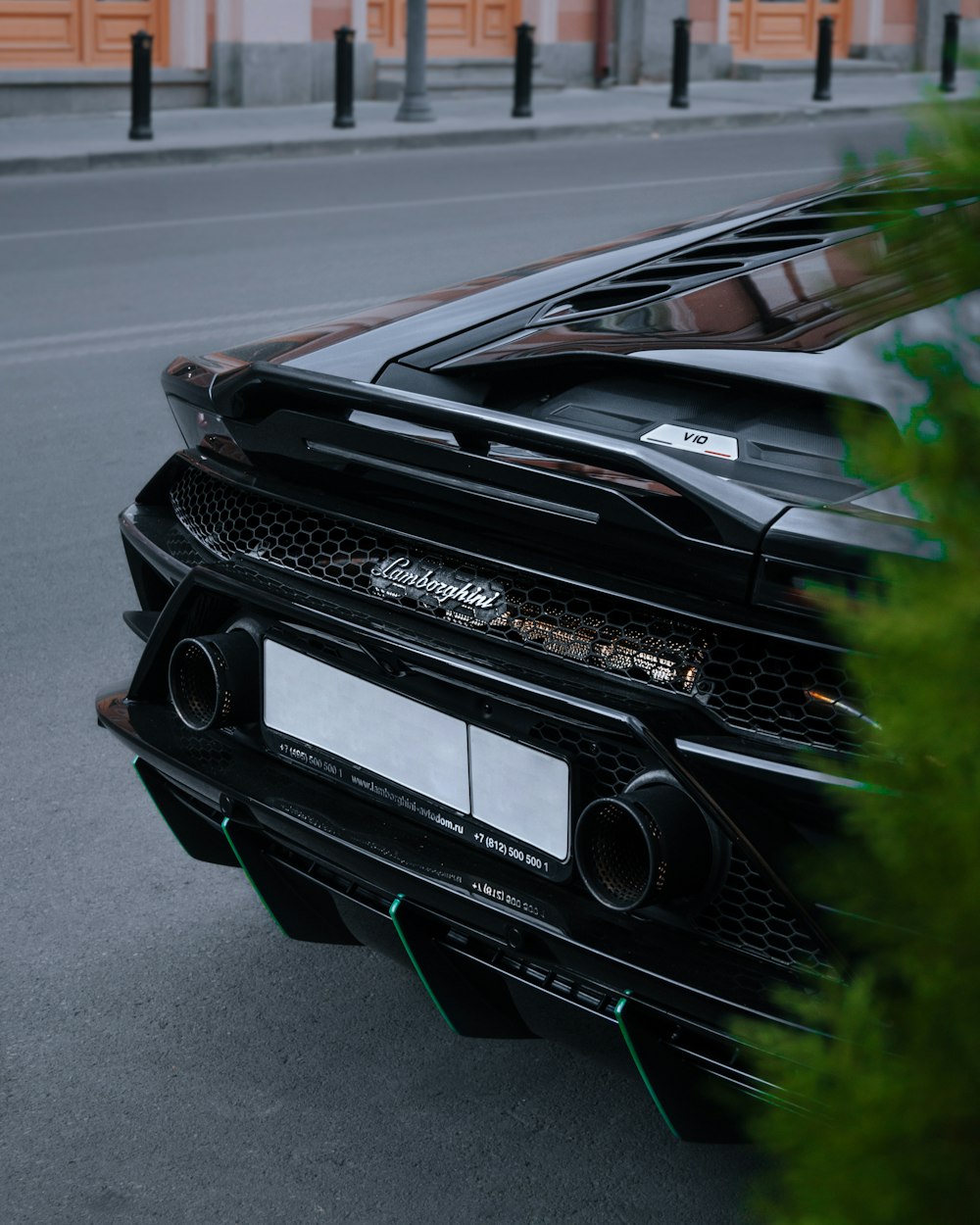 black chevrolet camaro on road during daytime