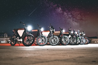 black and red motorcycle on road during night time