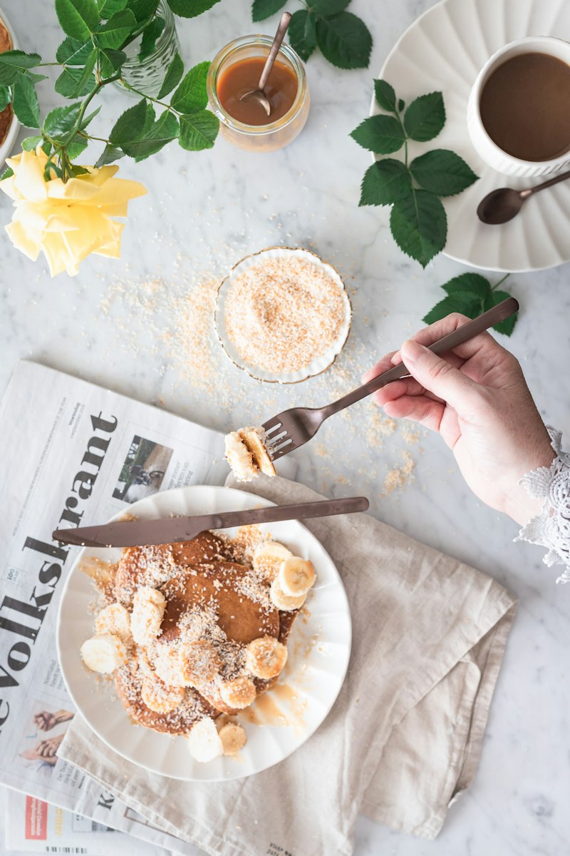 Whisking pancake batter in a bowl