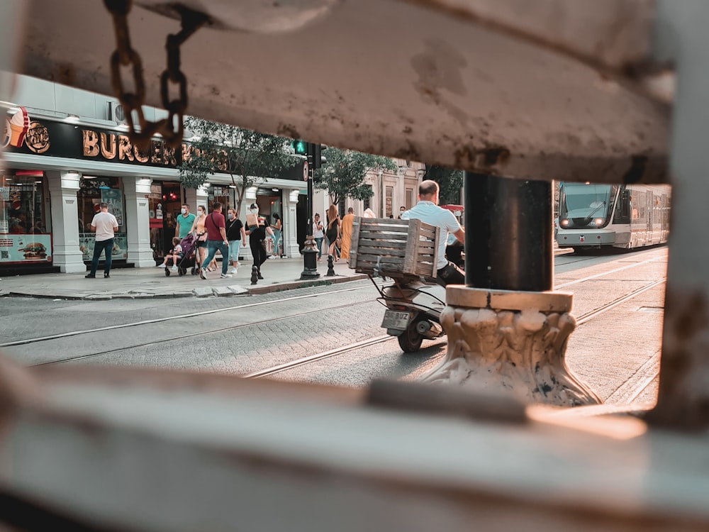 people walking on sidewalk during daytime