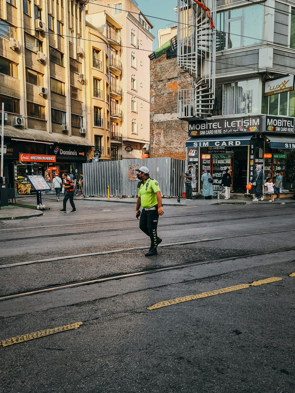 people walking on pedestrian lane during daytime