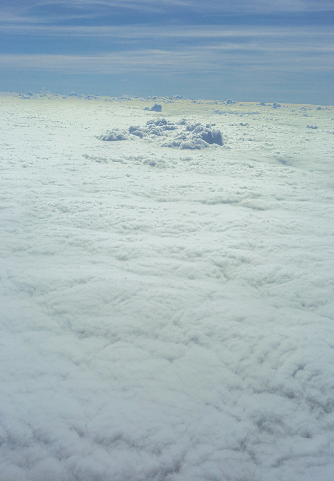 snow covered field during daytime