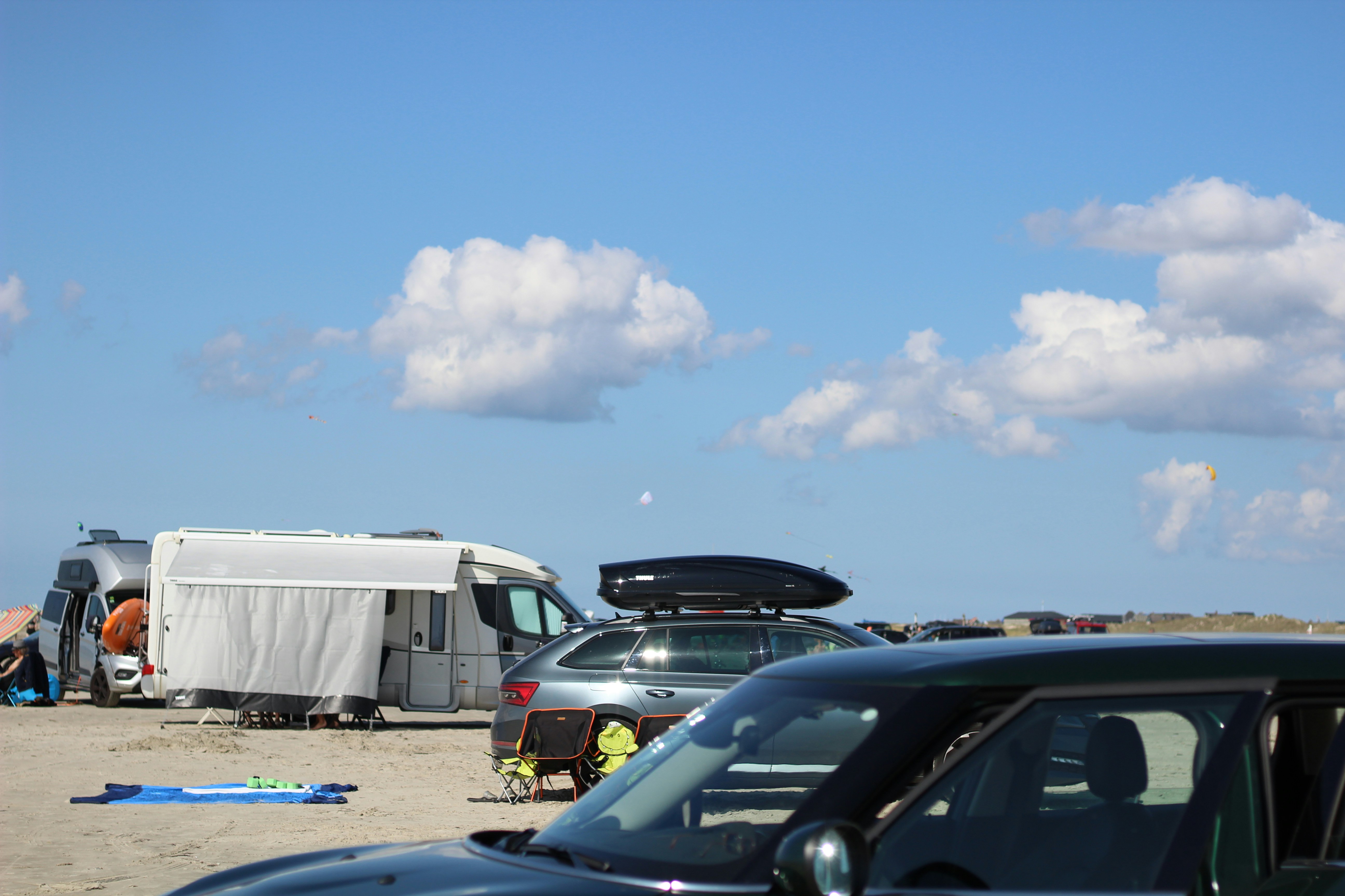 cars parked on parking lot during daytime