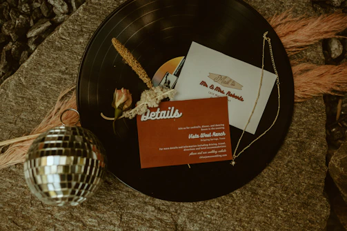An elegant jewelry holder shaped from a gently warped vintage vinyl record.