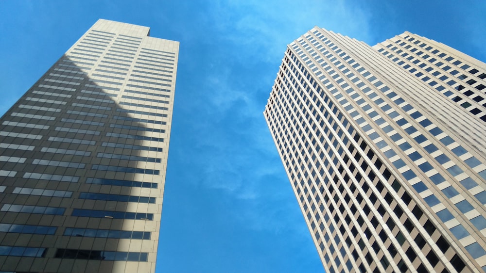 white and blue concrete building under blue sky during daytime