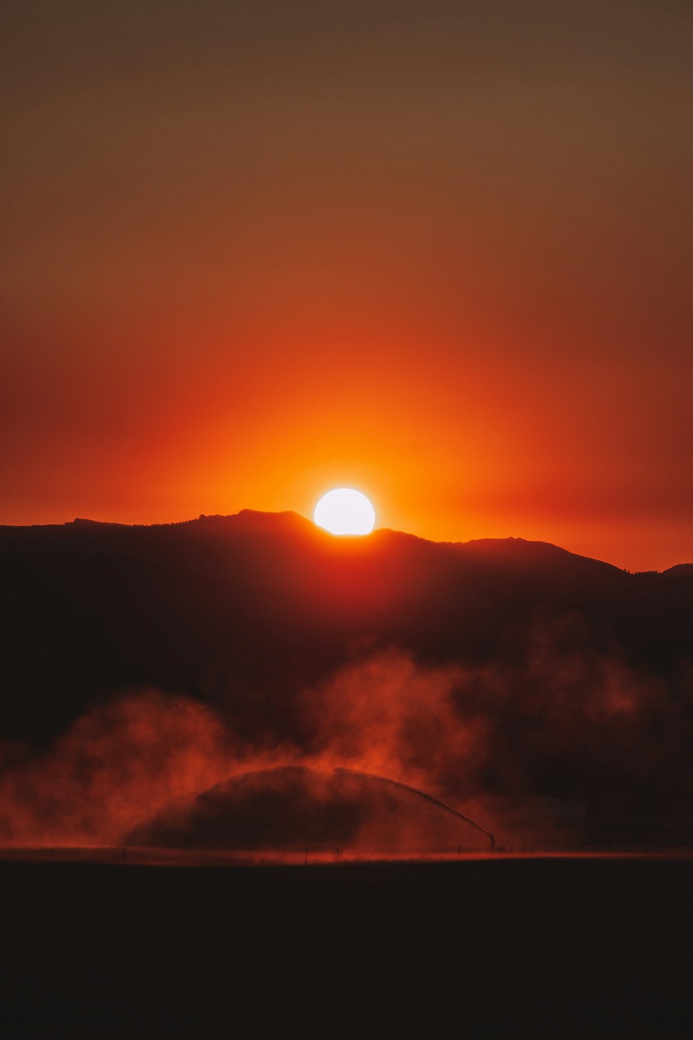 silhouette of mountain during sunset