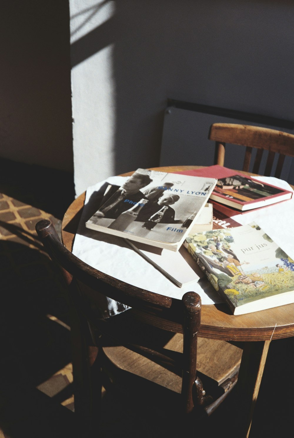 magazines on brown wooden table