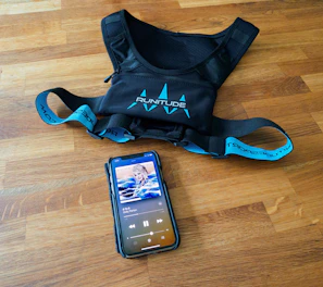 black samsung android smartphone on black backpack