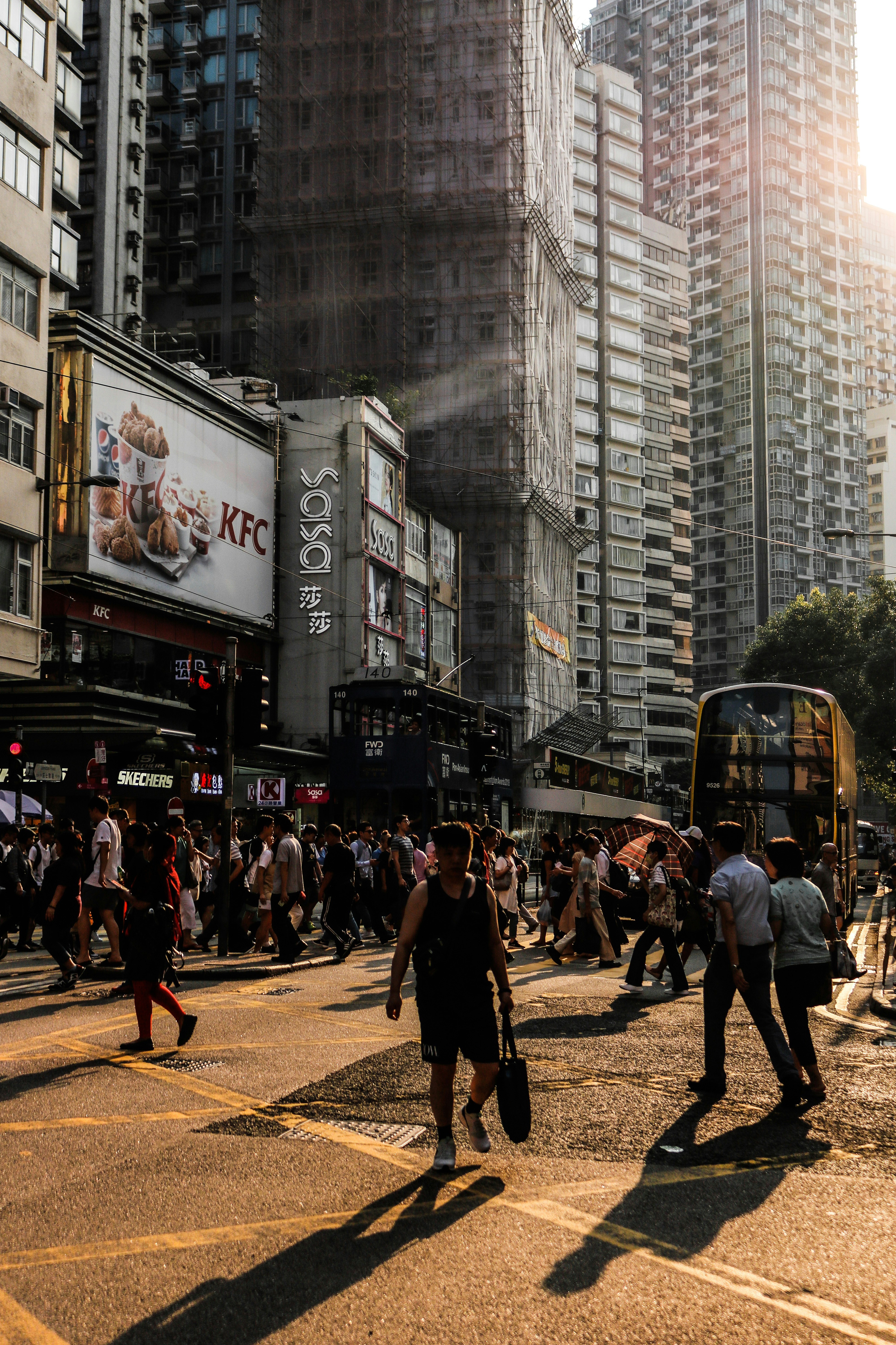 People crossing road in Hong Kong