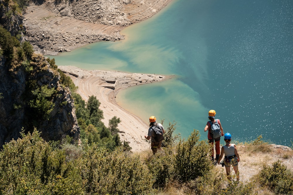 people hiking on mountain during daytime