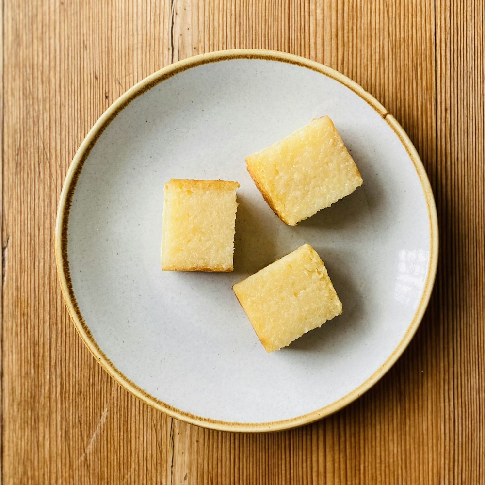 sliced cheese on white ceramic plate