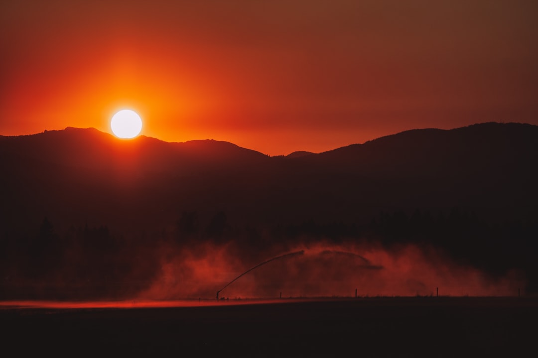 silhouette of mountain during sunset