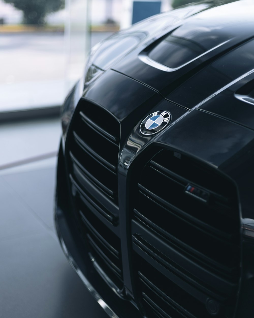 black mercedes benz car in a parking lot