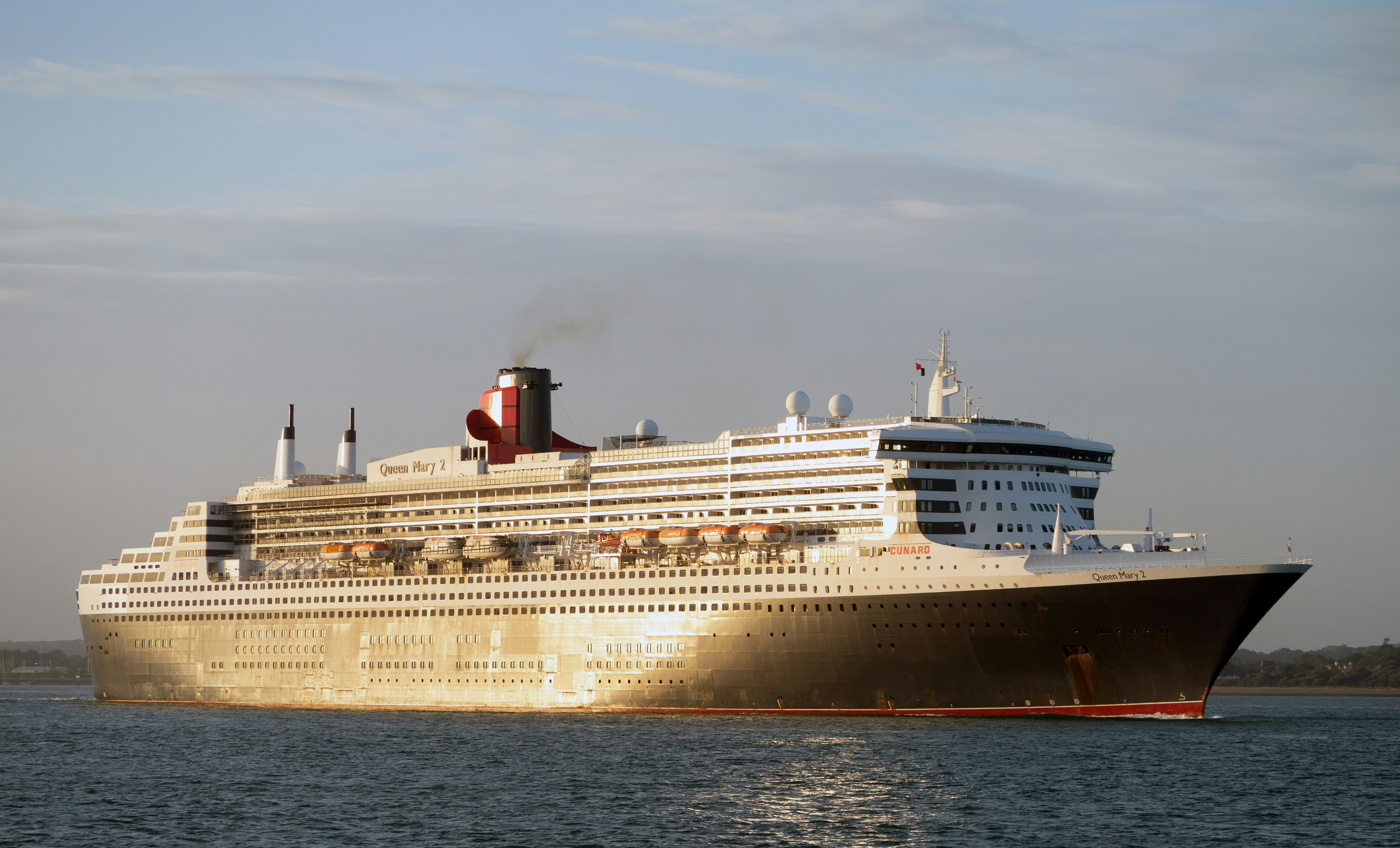 white and red cruise ship on sea during daytime