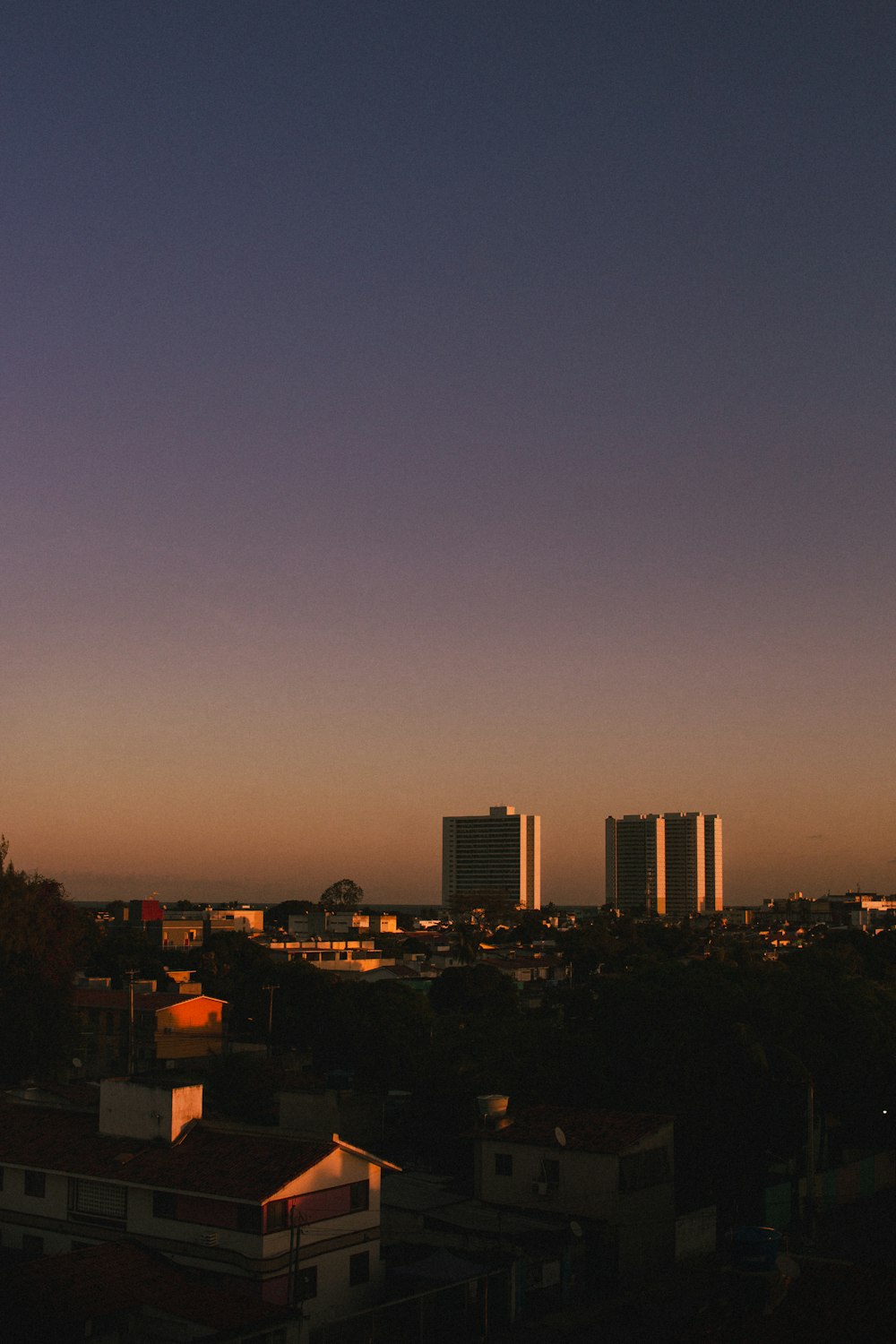 city skyline during night time