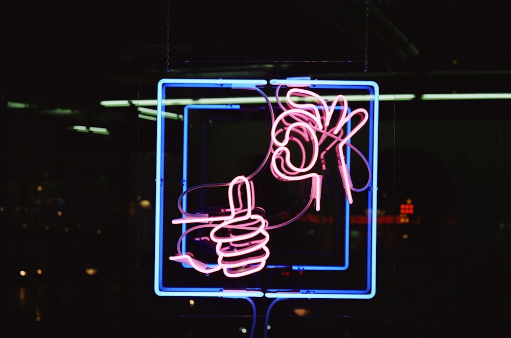 blue and red neon light signage