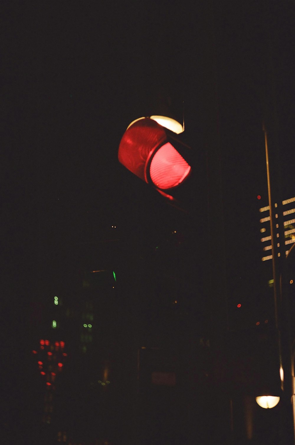 red and black street light during night time