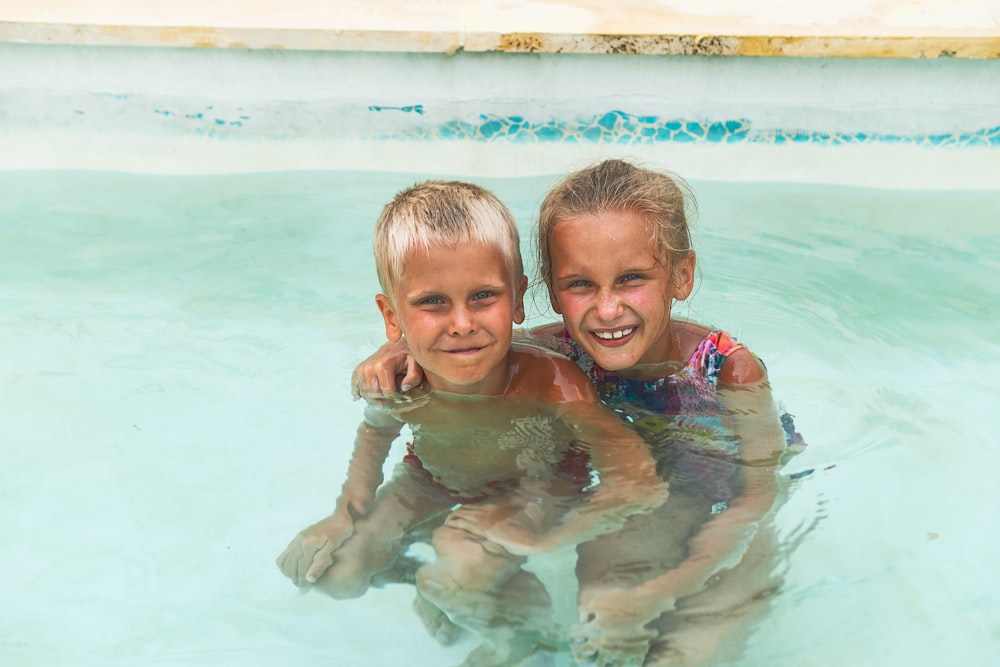 2 boys in swimming pool