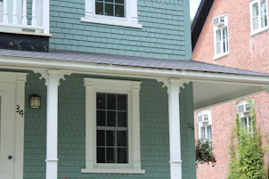 white and brown brick house