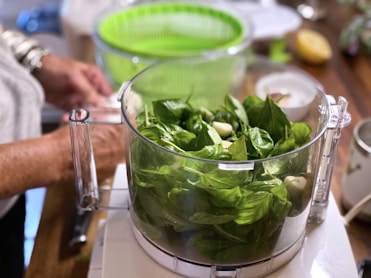 green vegetable in clear glass bowl