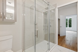 clear glass door with white steel frame