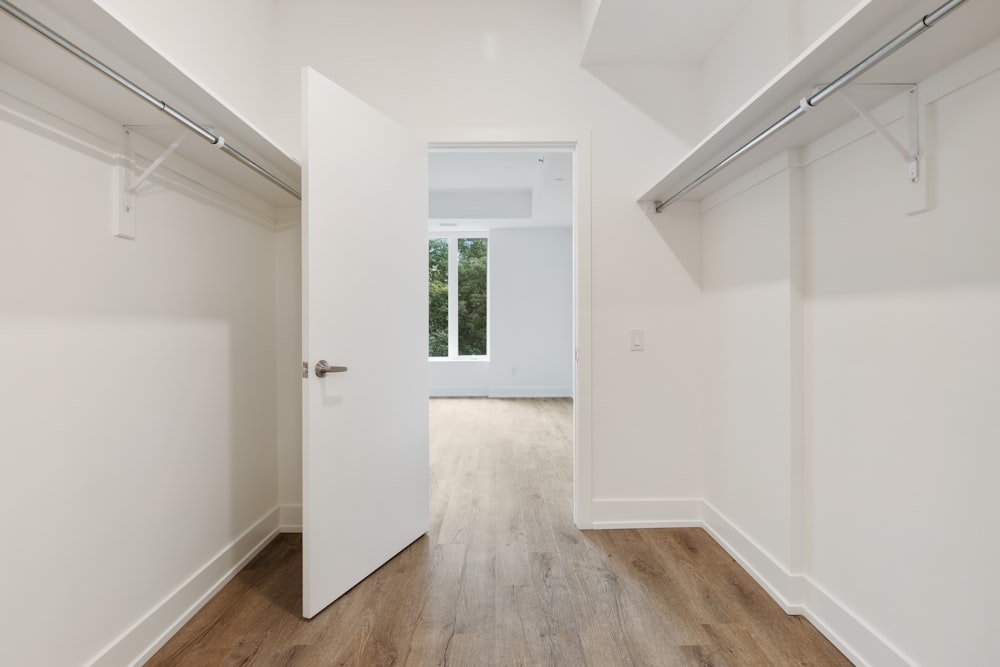 white wooden door on white painted wall