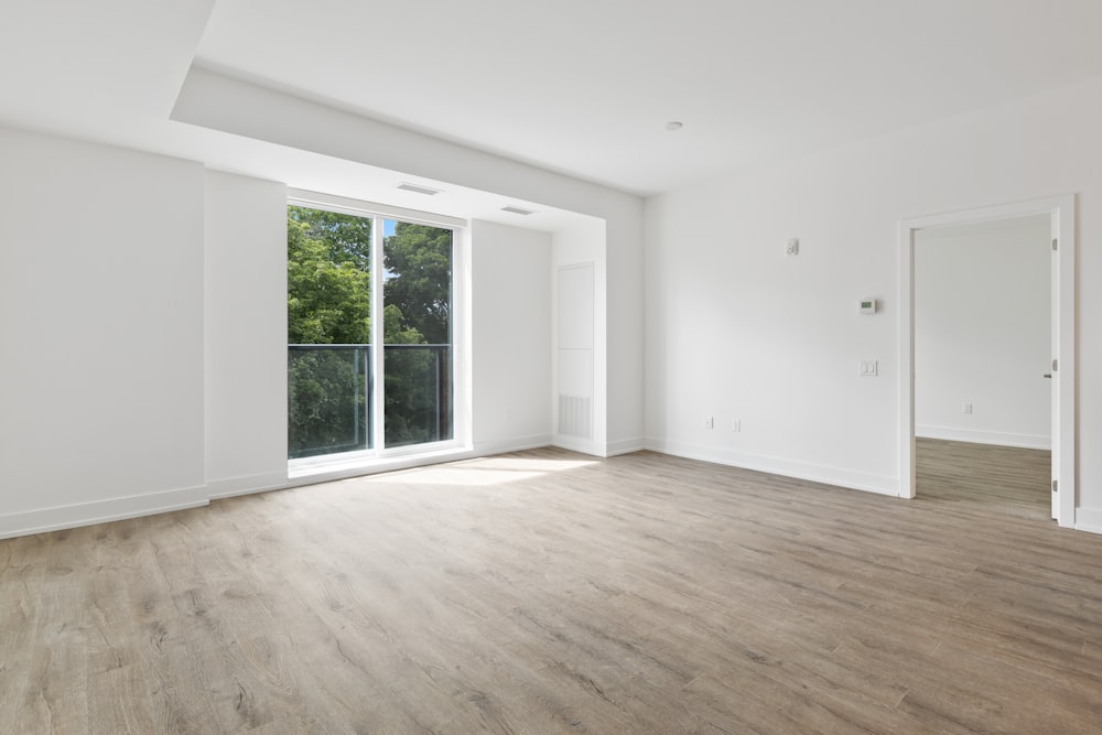 white wooden framed glass window