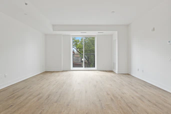 white wooden framed glass door