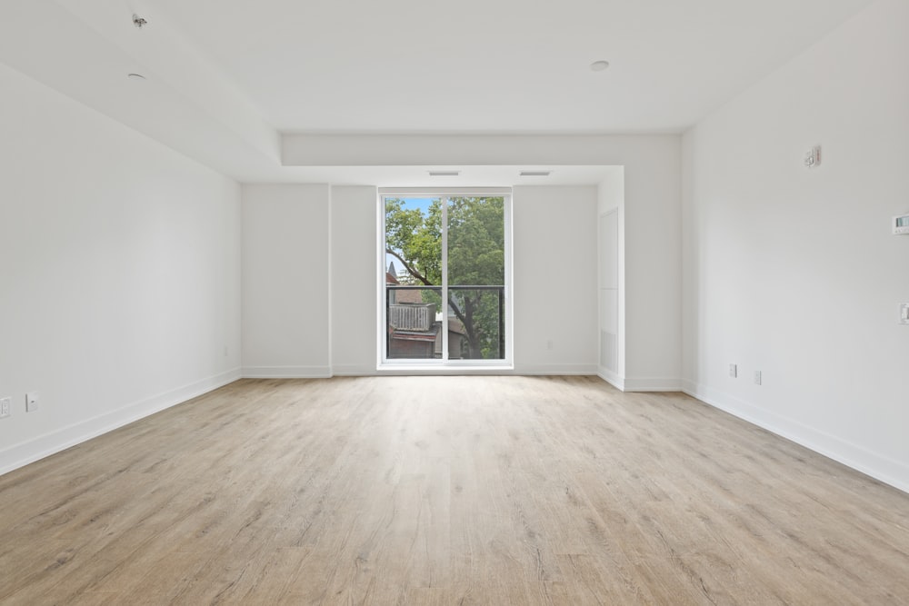 white wooden framed glass door