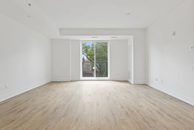 white wooden framed glass door