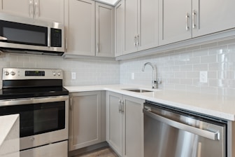 silver and black microwave oven