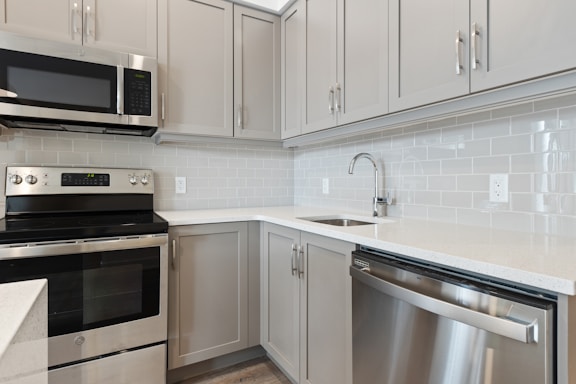 silver and black microwave oven