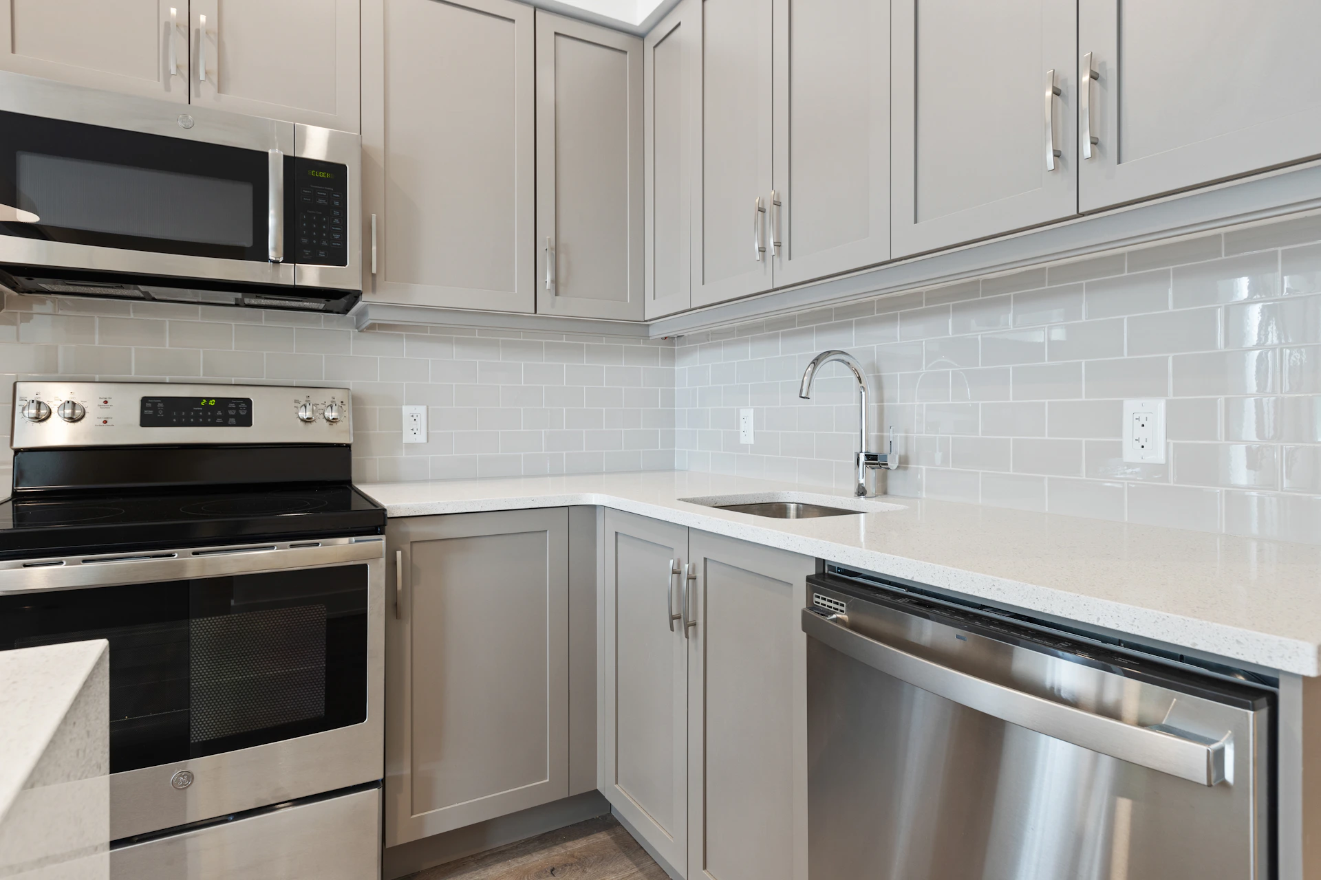 silver and black microwave oven