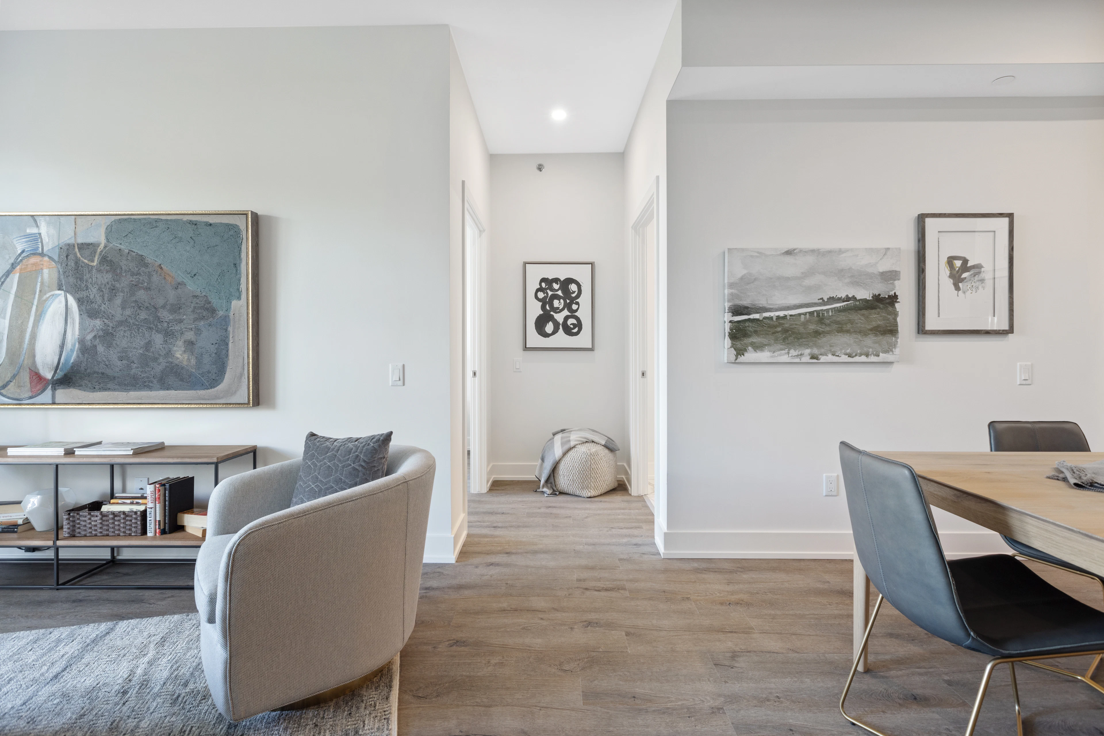 Small sitting area with a white armchair