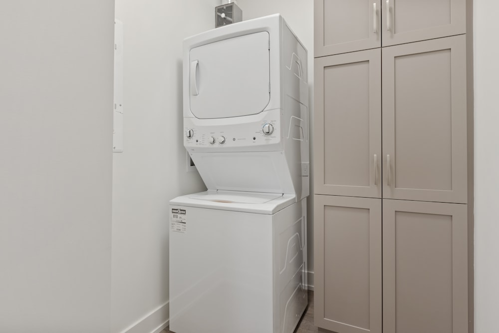 a washer and dryer in a small room