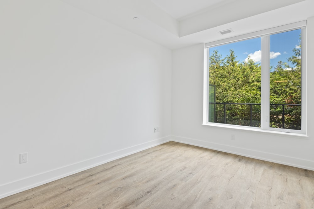 white wooden framed glass window