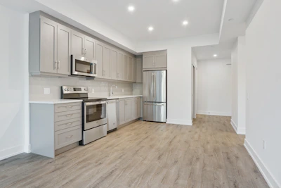 white and brown kitchen cabinet