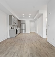 brown wooden parquet floor and white wall