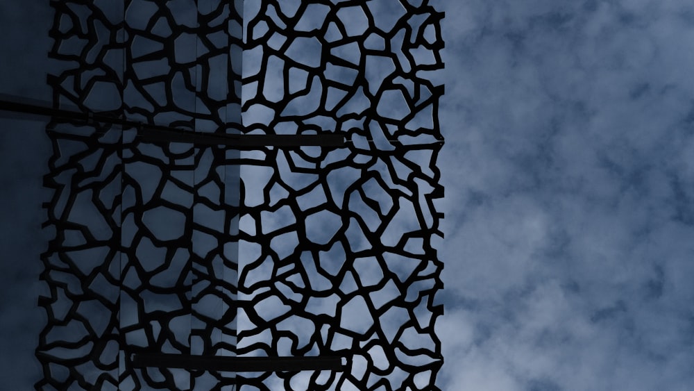 white and black textile under blue sky