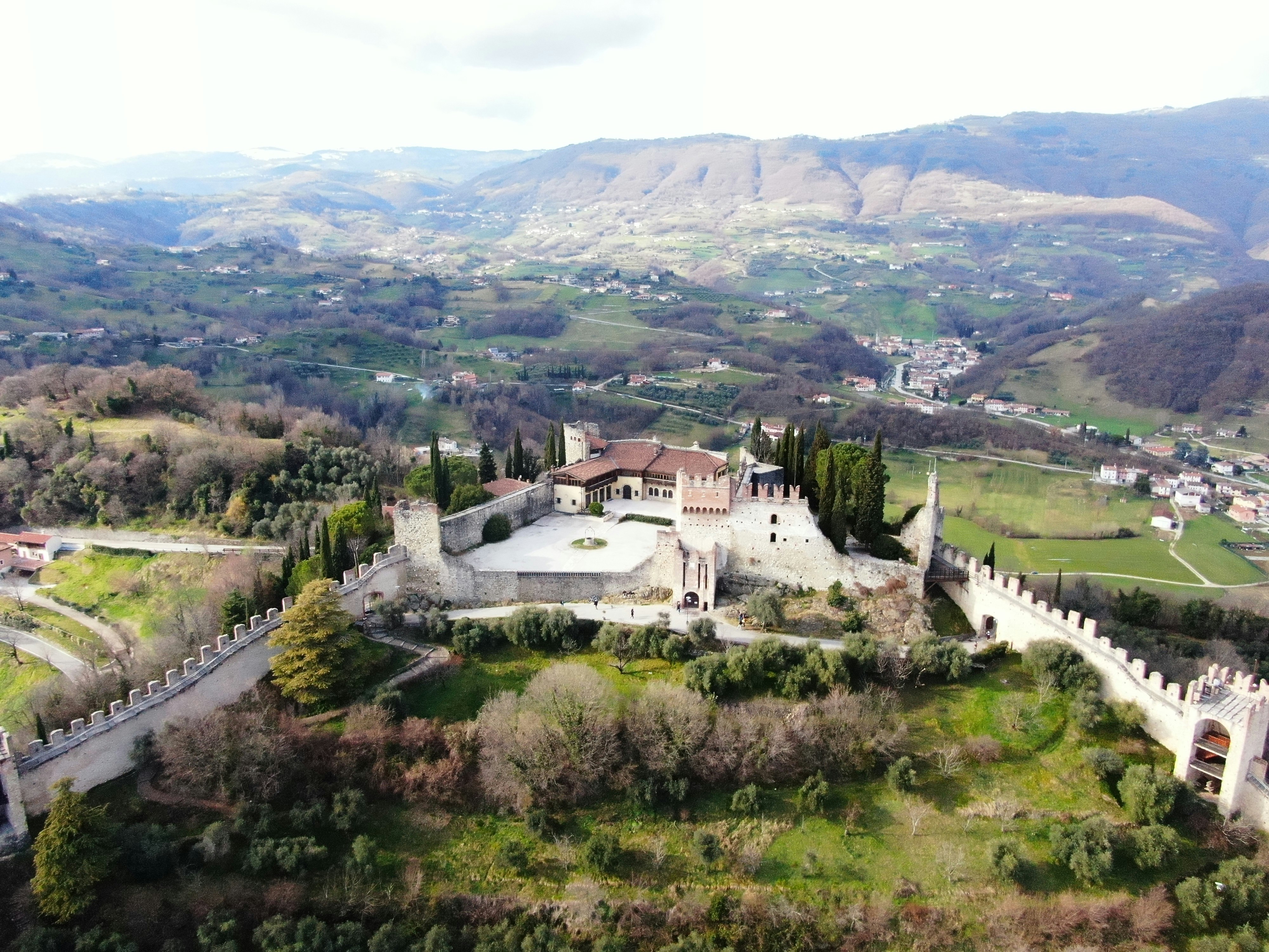white concrete building on green grass field during daytime
