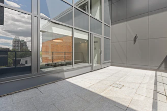 white wooden framed glass door